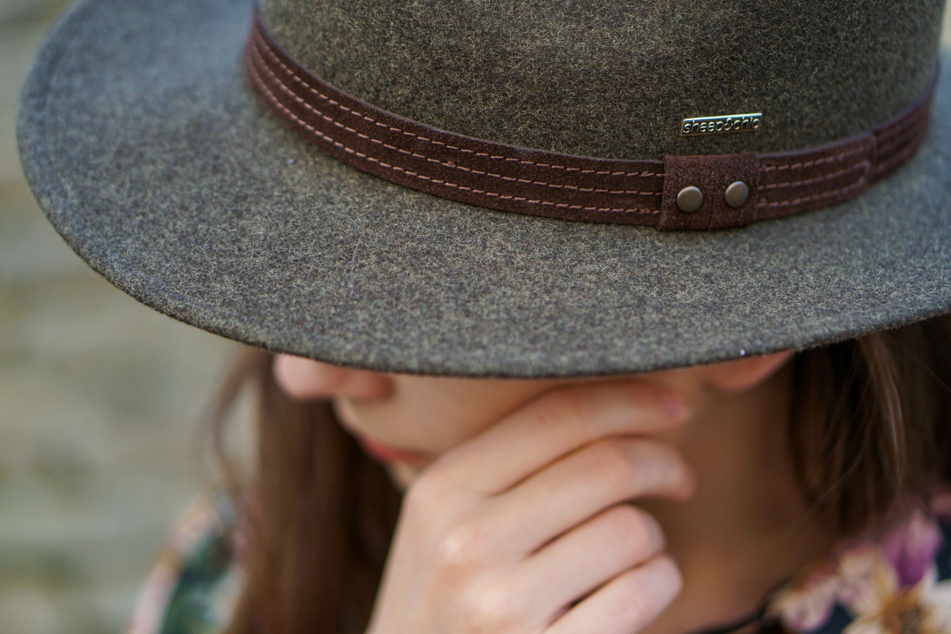 Women's grey wool felt hat with brown leather band