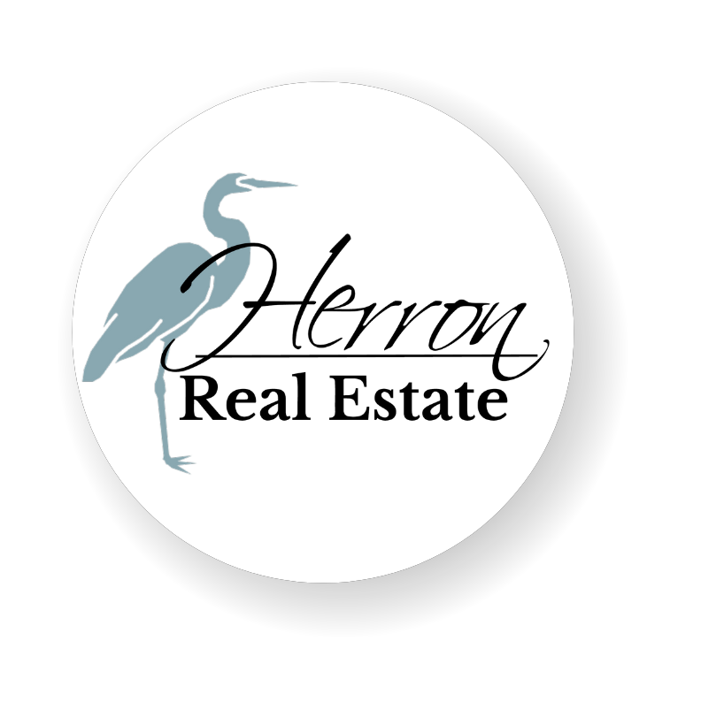 Logo for Crossview Realty: teal C and gray V above text 