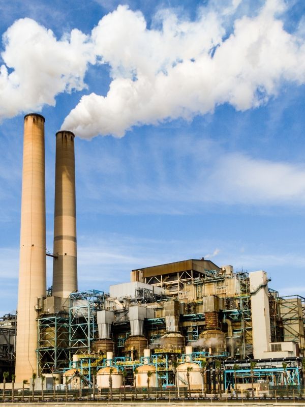 Industrial electrical contractor working on power distribution and electrical systems at a manufacturing facility, delivering industrial electrical services and power wiring.