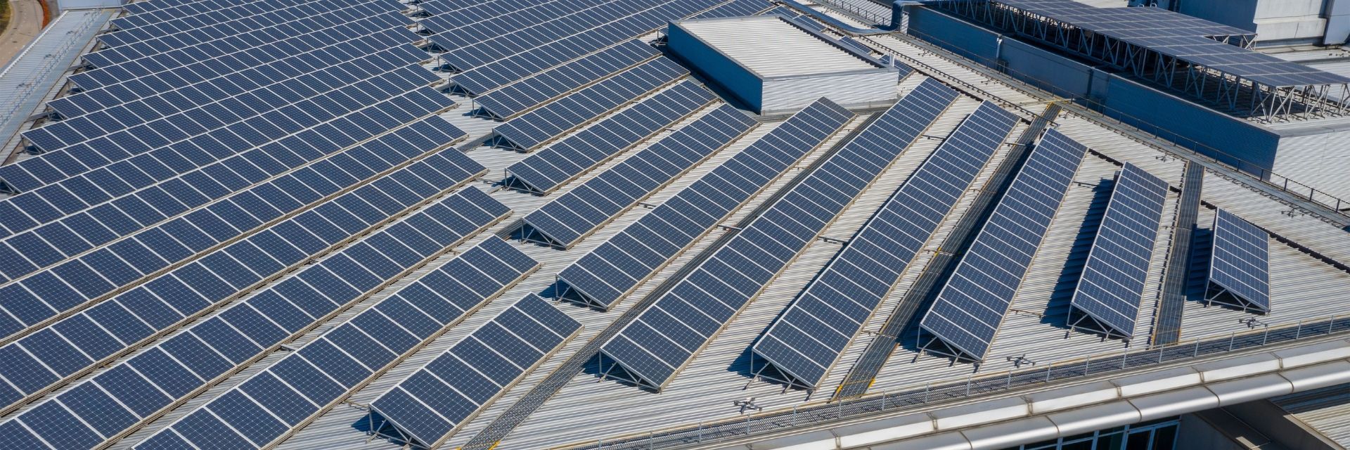 Solar panel installation on a commercial building rooftop
