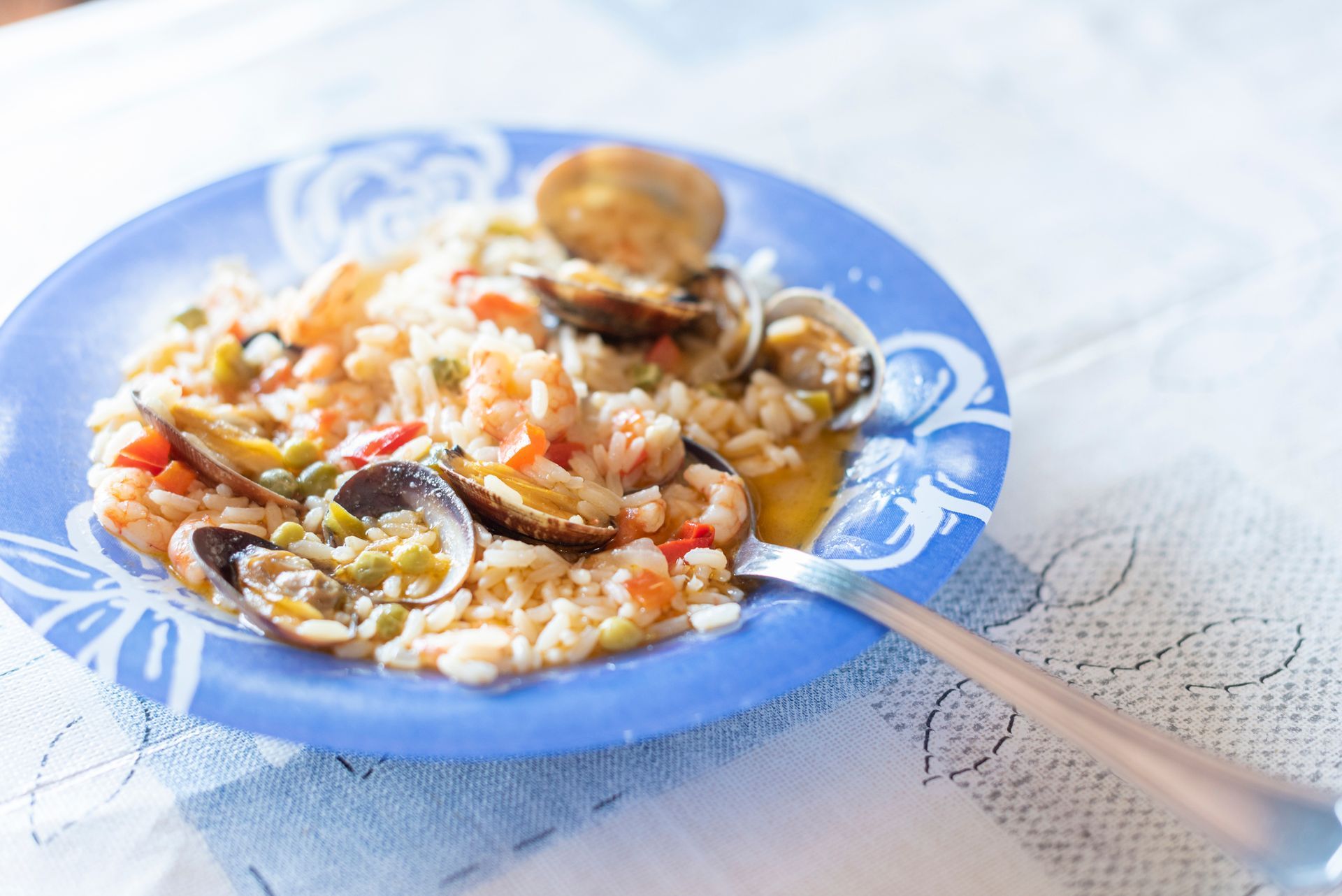 Rice with seafood on a dinner plate — Conway, SC — Graham Seafood Supplies Inc. Rice with seafood on a dinner plate — Conway, SC — Graham Seafood Supplies Inc.