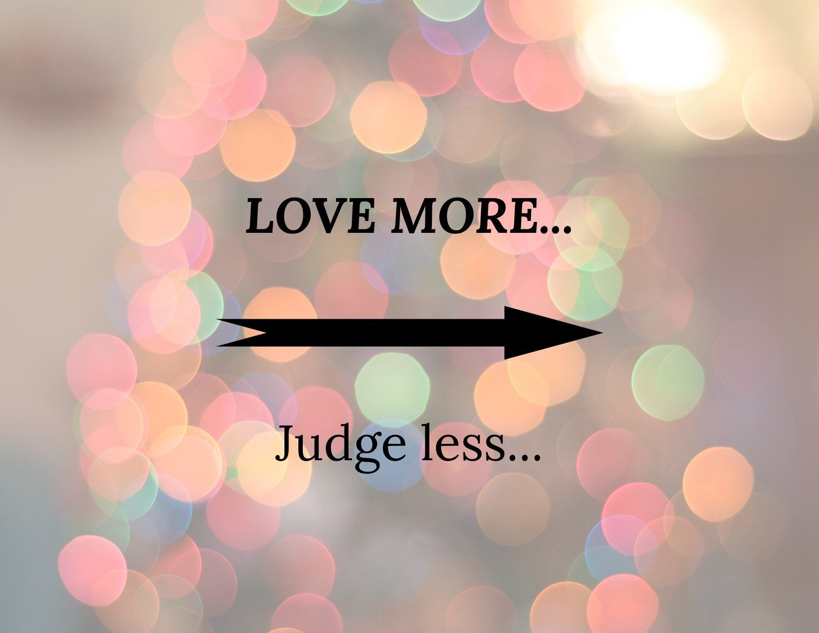 A sign that says love more and judge less