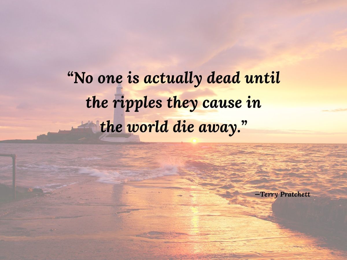 A quote on a beach with a lighthouse in the background