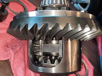 Close-up view of a differential gear assembly, showing internal gears and housing. | Lains Auto Service