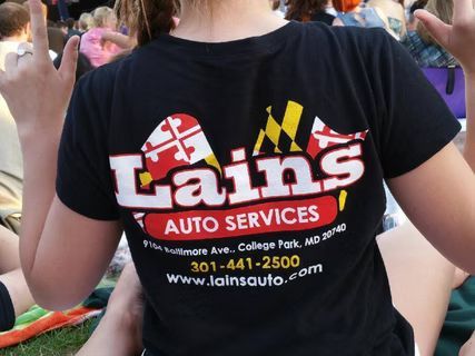 Person wearing a black t-shirt with 