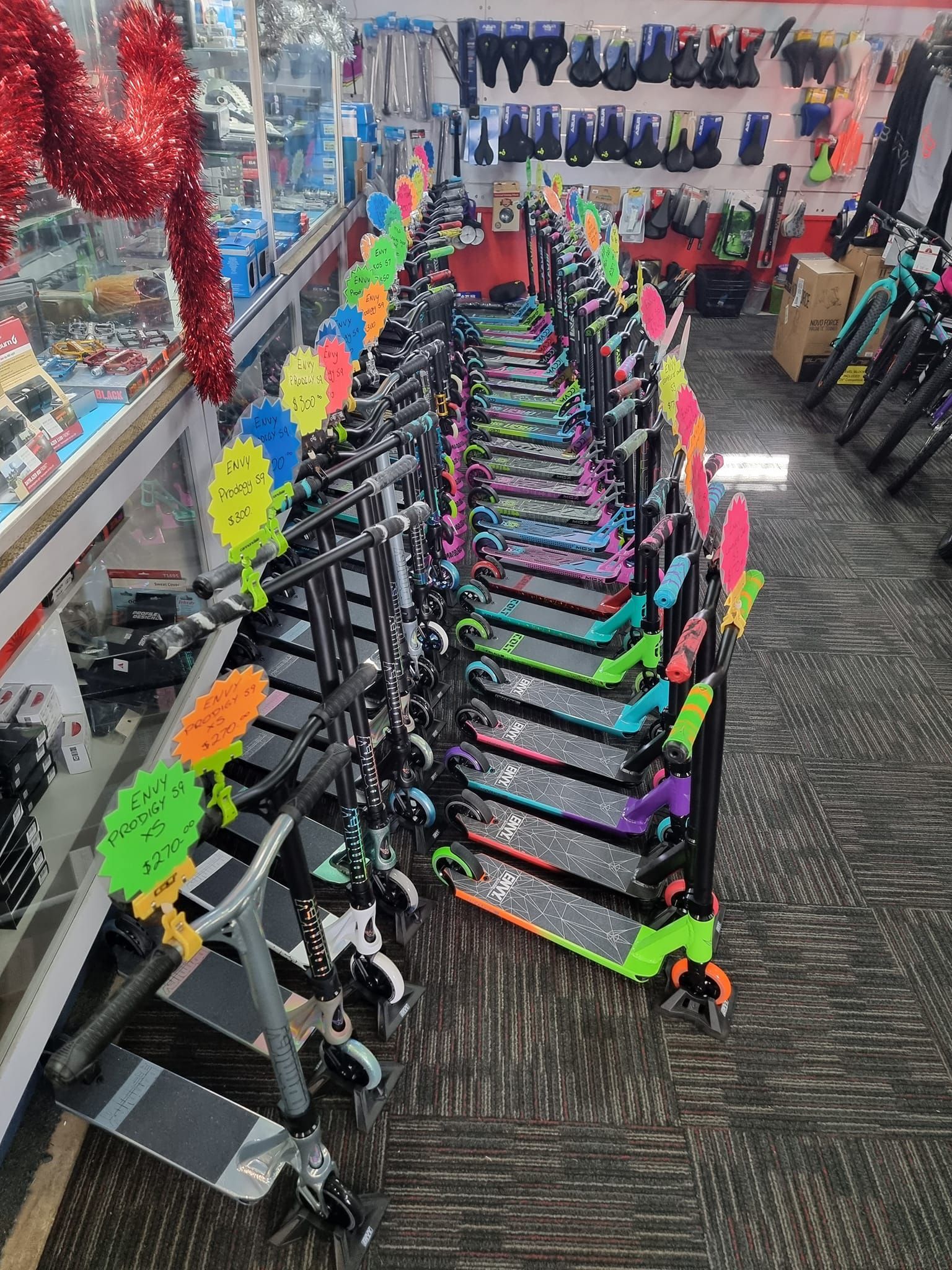 A Row of Colourful Scooters — City Centre Cycles in Berserker, QLD