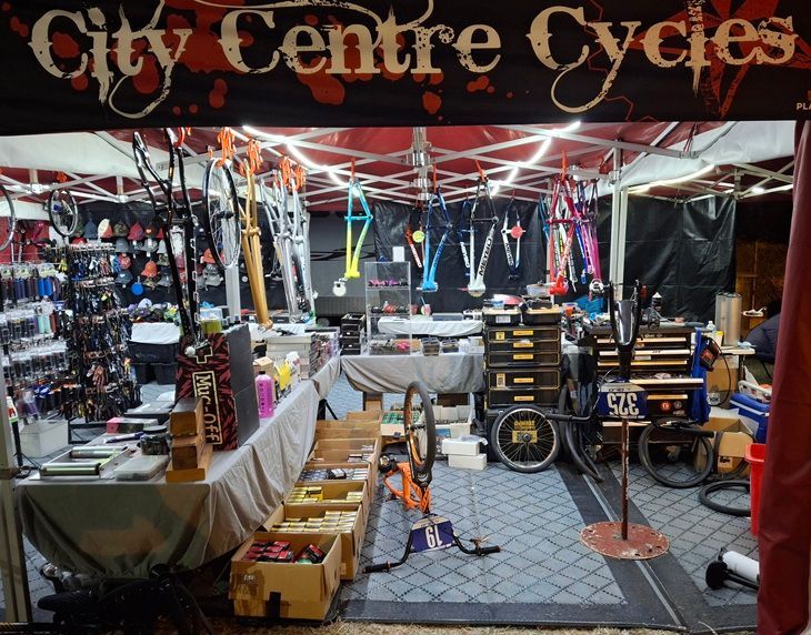 Indoor Bicycle Shop with Rows of Hanging Bikes — City Centre Cycles in Berserker, QLD