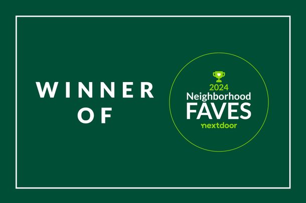 A green sign that says winner of neighborhood faves