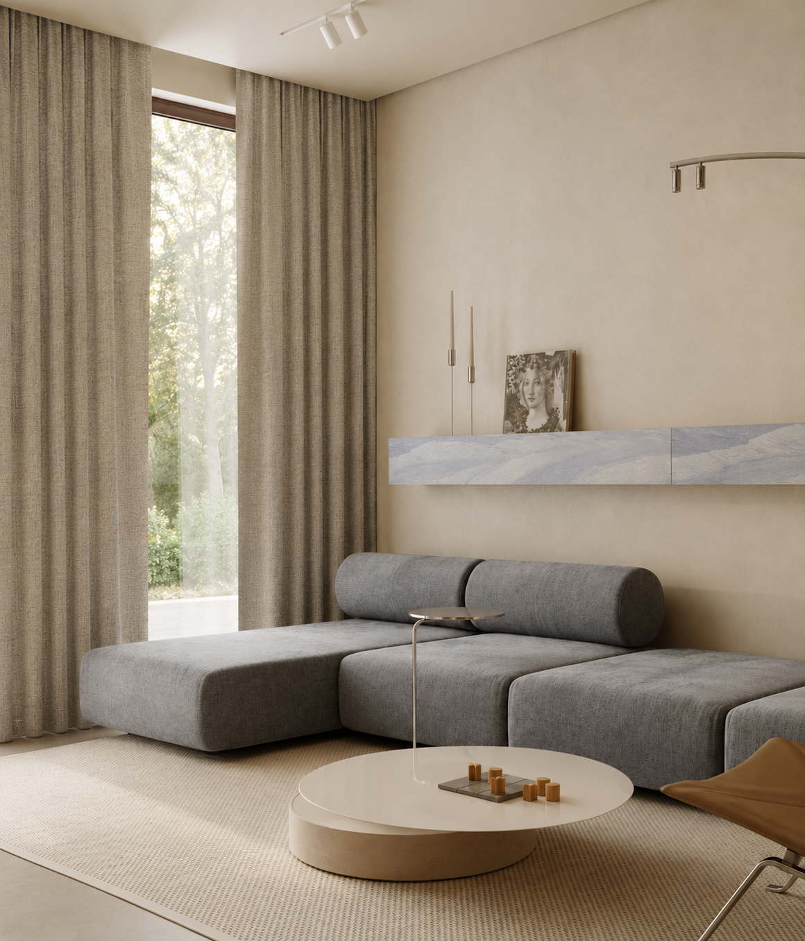 Modern beige living room with gray sectional sofa, round coffee table, and tall curtains by a window