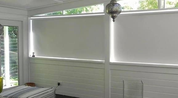 A Close up Of a Window with Blinds on It — Bay Blinds & Doors in Gosford, NSW