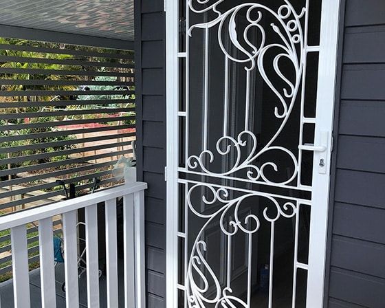 A House with A Swimming Pool in The Backyard — Bay Blinds & Doors in Wyong, NSW