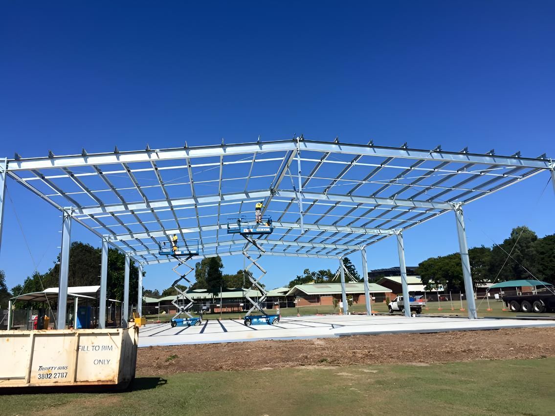 A Large Metal Structure is Being Built in a Field — Geiger Solutions In Clermont, QLD