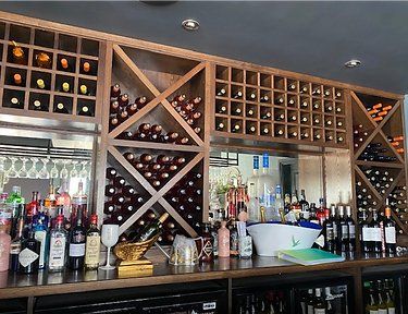 bar with a wooden bottle holder