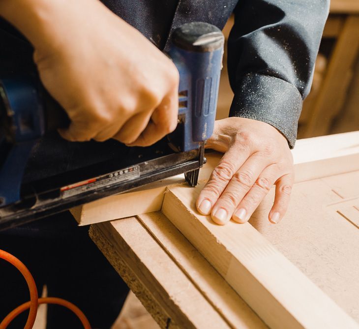A Person is Using a Stapler on a Piece of Wood — Beerwah Co-Op in Beerwah, QLD