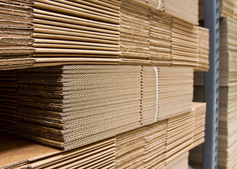 A Stack of Cardboard Boxes in a Warehouse — Beerwah Co-Op in Beerwah, QLD