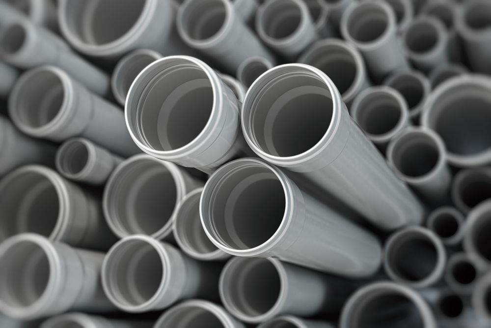 A Stack of Metal Pipes With Tags on Them — Beerwah Co-Op in Beerwah, QLD