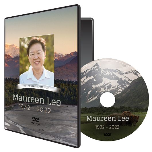 Memorial DVD case and disc for Maureen Lee, with portrait and mountain sunset design