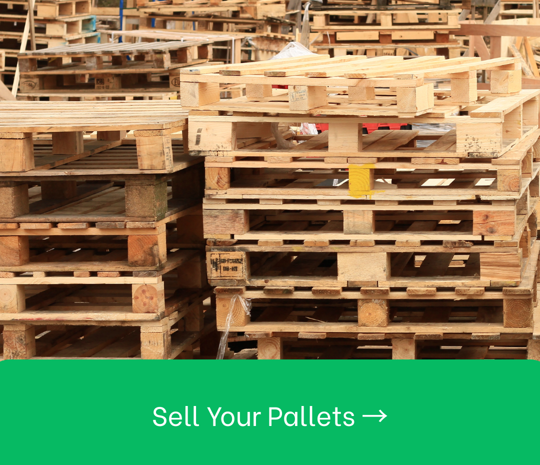 A bunch of wooden pallets are stacked on top of each other.