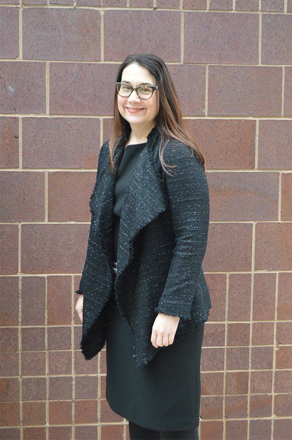 Attorney Aimee Is Reading Book - Grosse Pointe Farms, MI - Dodson Fowler Williams & Nesi