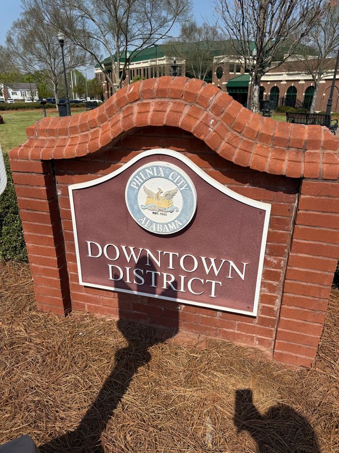 A brick sign that reads