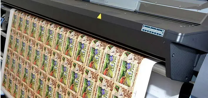 A Large Piece of Paper is Being Printed on a Large Printer — Aldine Printers in Bungalow, QLD