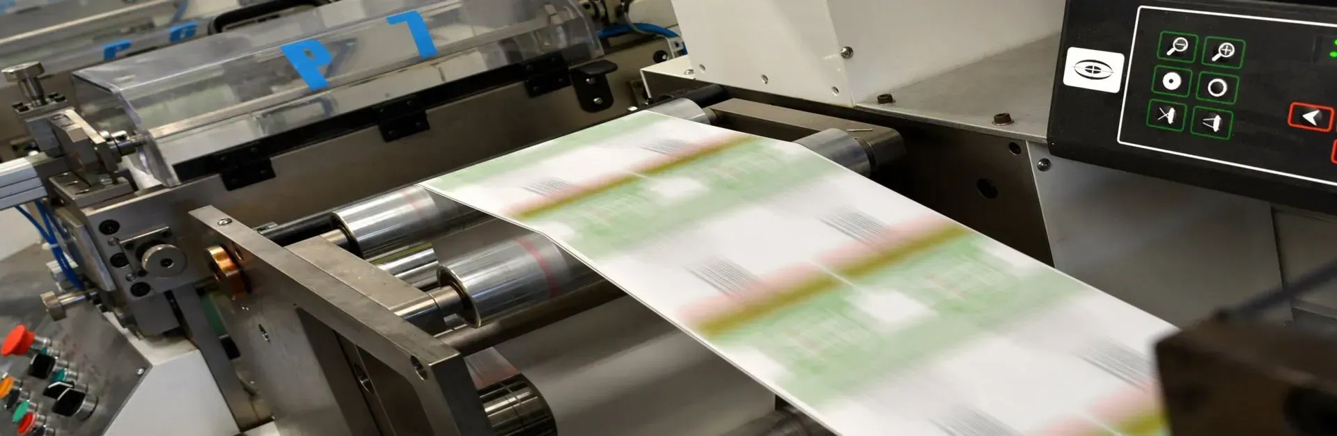 A Machine is Printing a Sheet of Paper on a Conveyor Belt — Aldine Printers in Bungalow, QLD