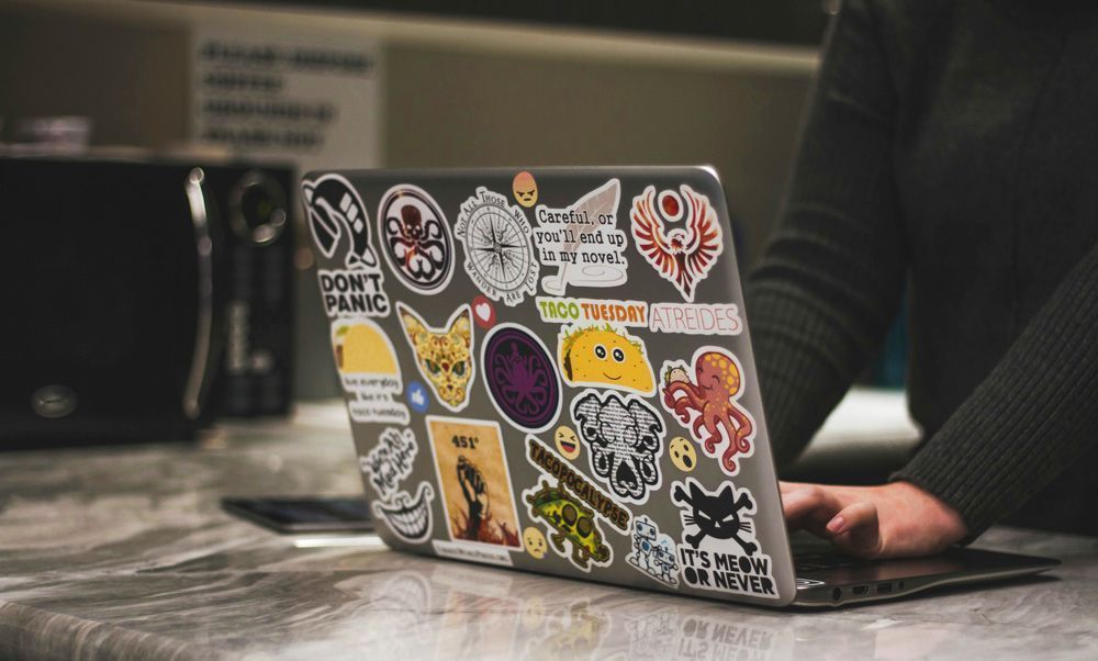 Collection-Of-Stickers-On-Laptop-Computer