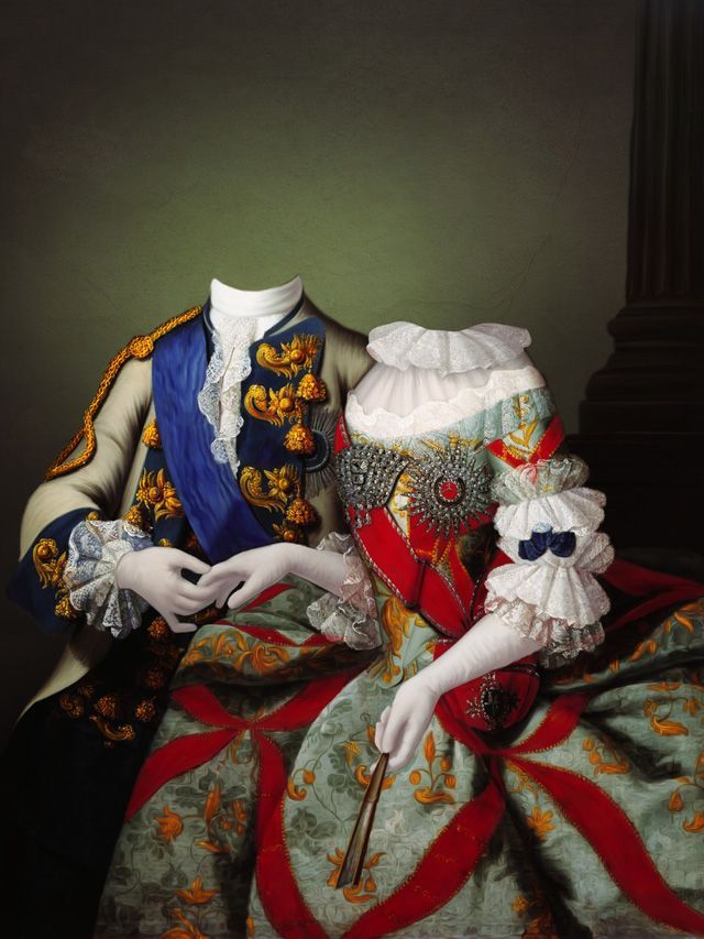 Formal attire: headless couple in ornate clothing, sitting together.