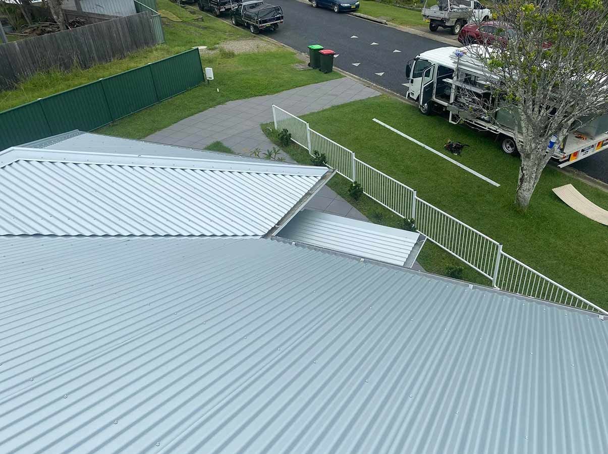 An Aerial View of a House With a Truck Parked in Front of It — Ben McLennan Constructions in Ballina, NSW