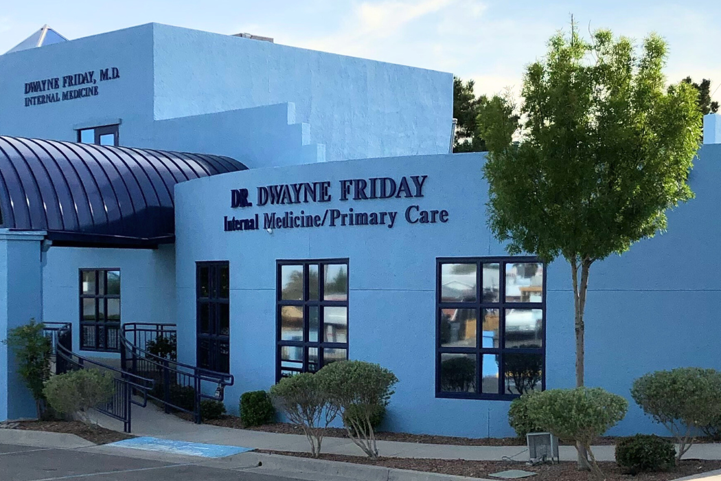 A blue building with the name m. wayne friday on it