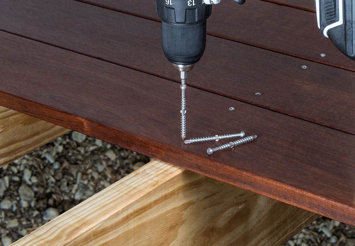 A Person Is Drilling With Bolts — All Trades Equipment In Lismore, NSW