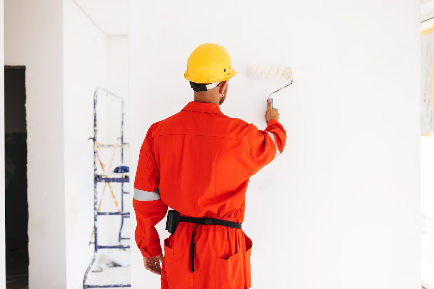 man painting wall long island