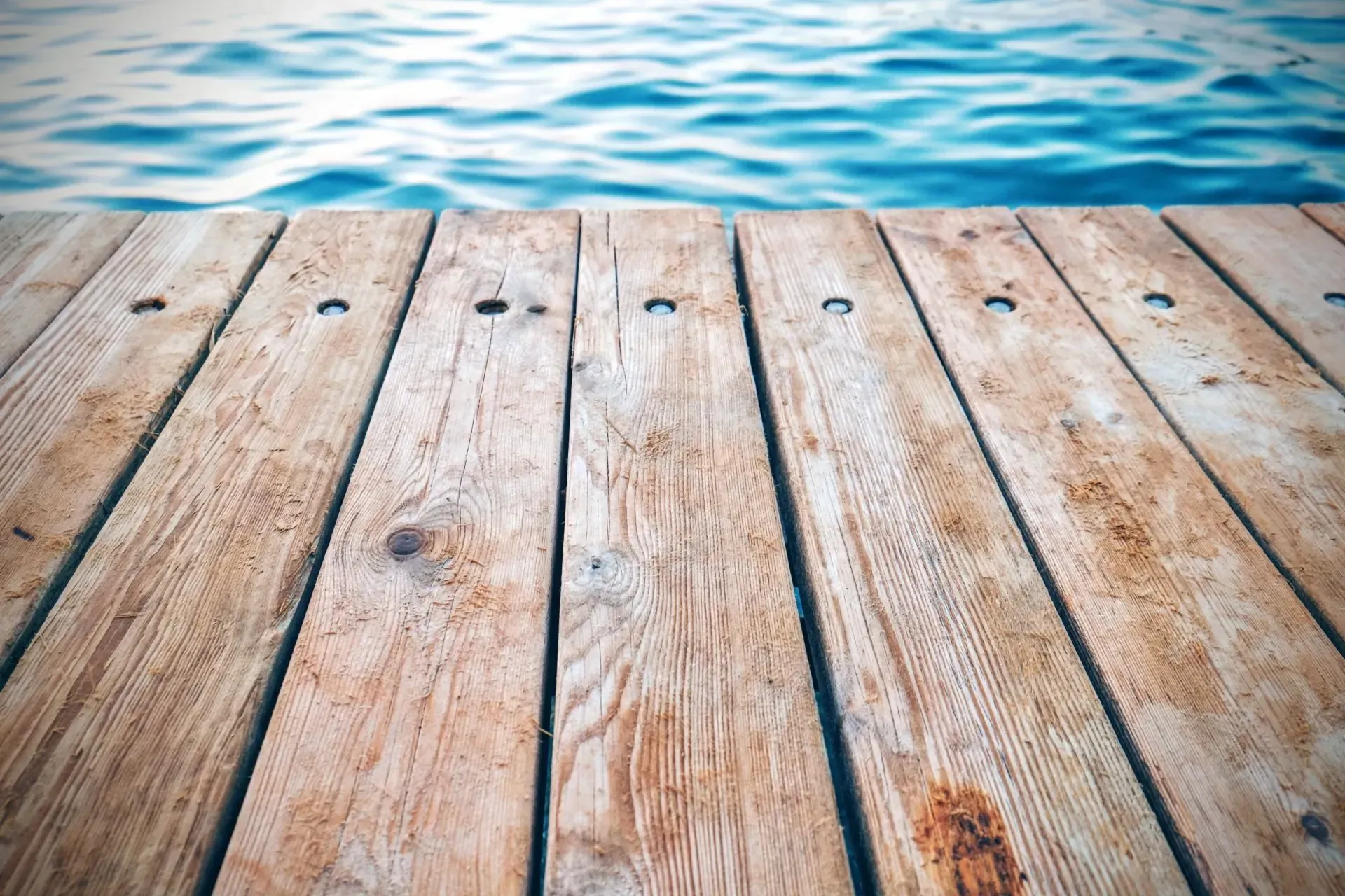 A wooden dock overlooking a body of water.