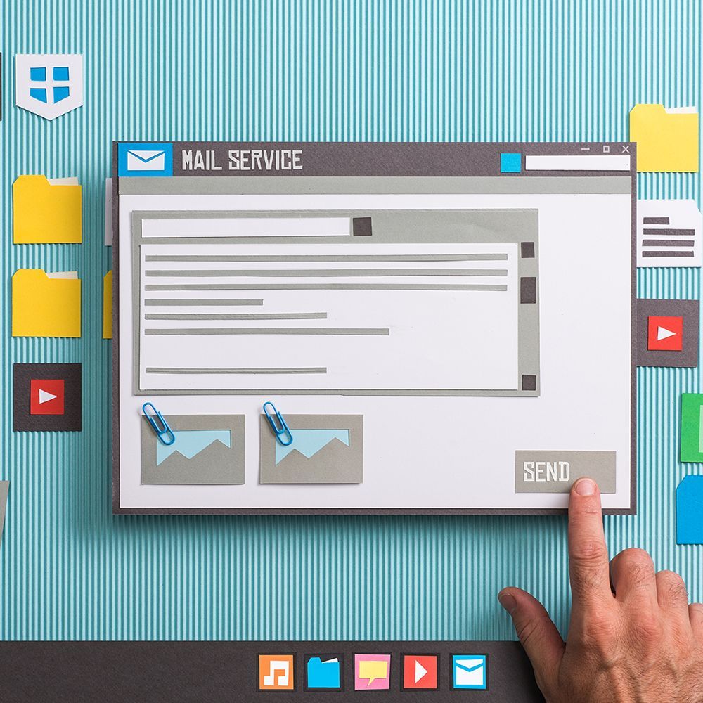 A person is pointing at a screen that says mail service on it.
