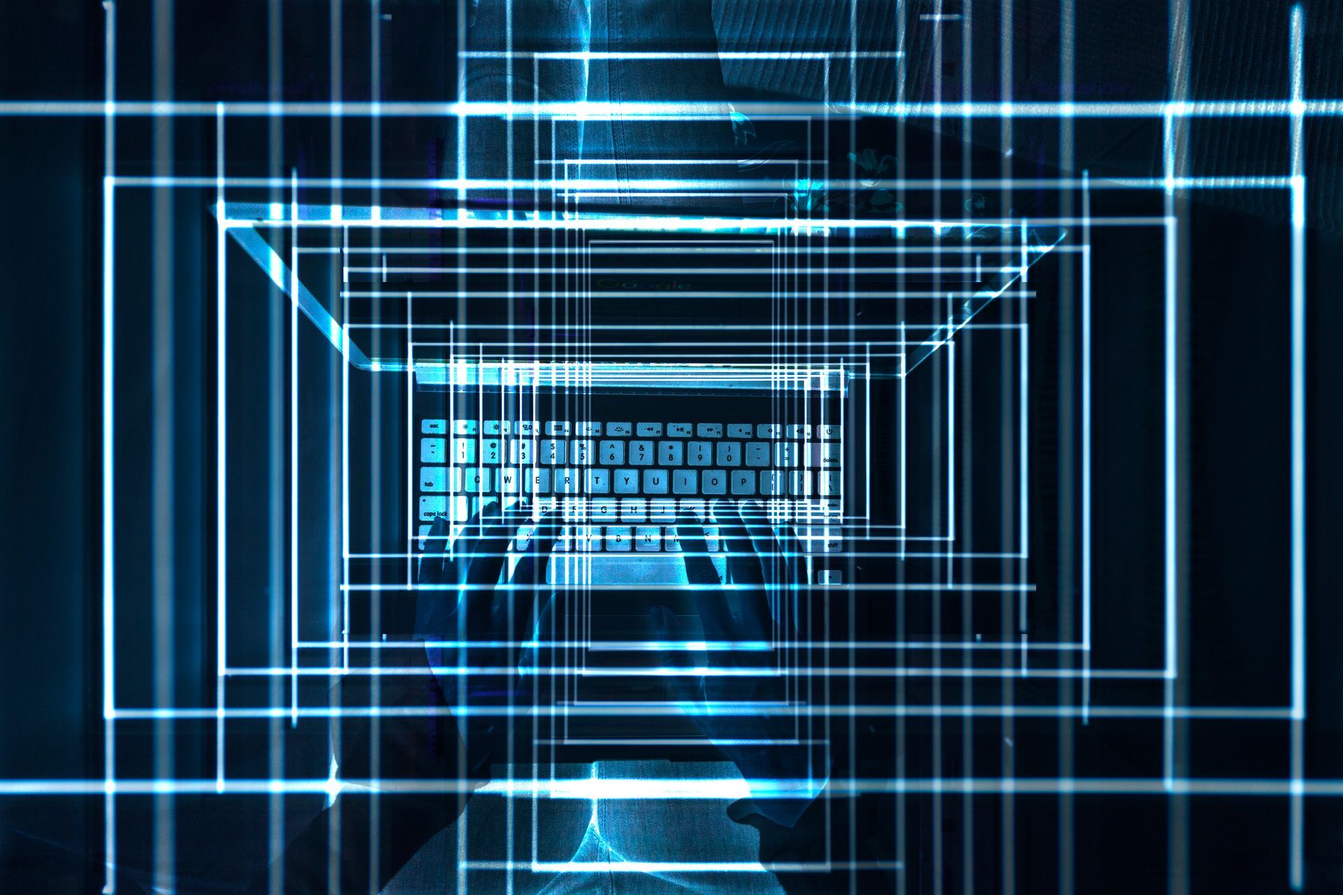 hands on laptop bright lights and numbers visual