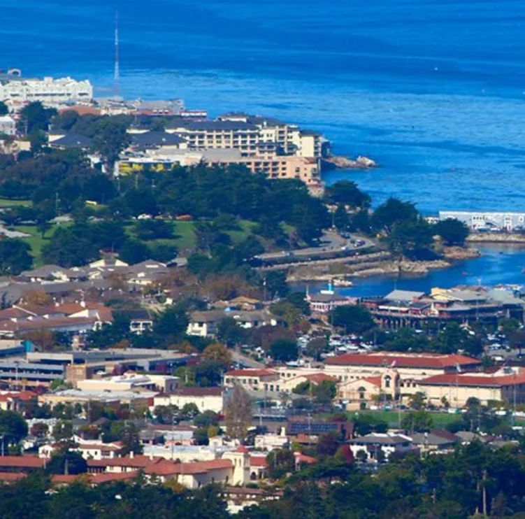 An aerial view of a city near the ocean