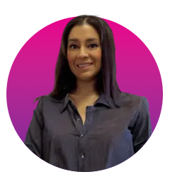A woman in a blue shirt is standing in a purple circle.