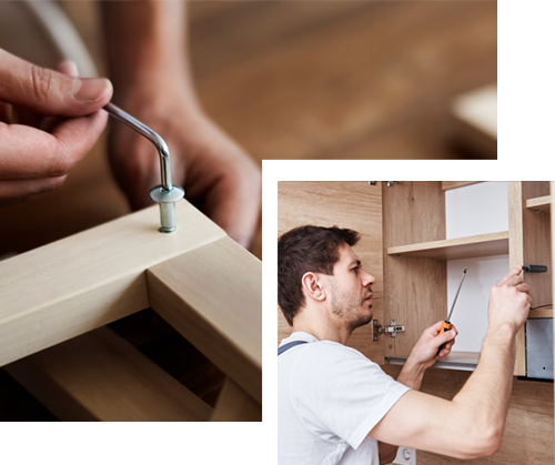 A man is fixing a sink in a kitchen.