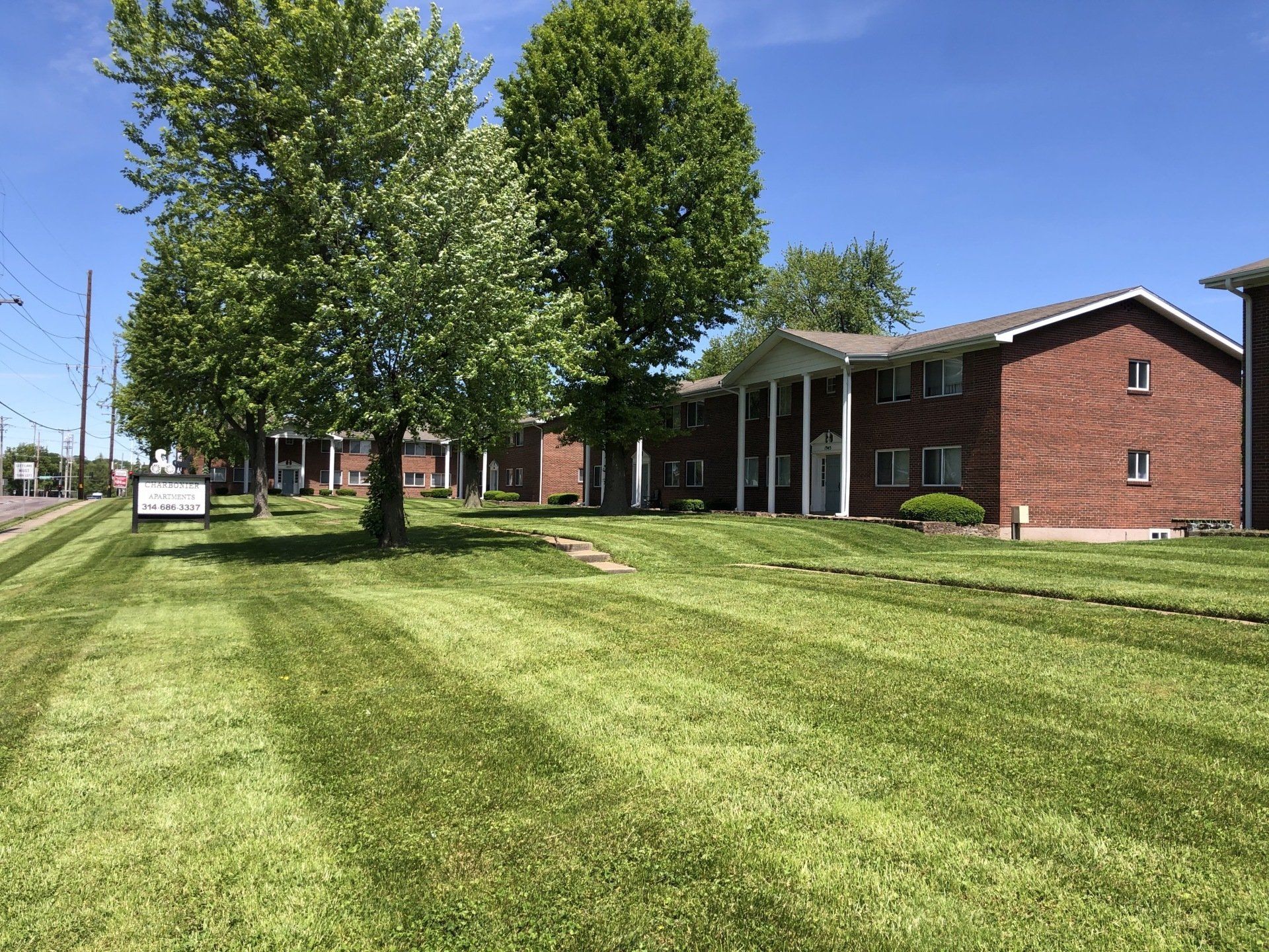Exterior of Charbonier Apartments brick building