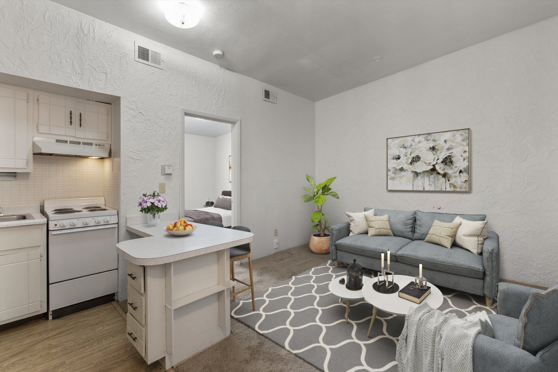 View of kitchen, breakfast bar and living room