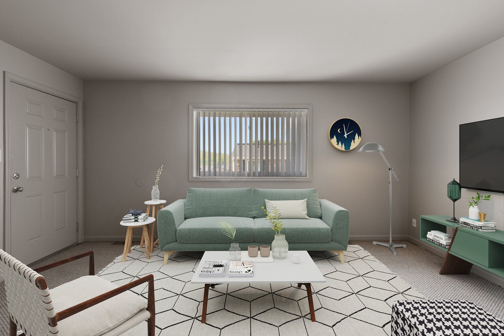 Teson Garden Apartments living room with window, and couch, side table, rug, coffee table, chair, and lamp - furniture for example purposes only.