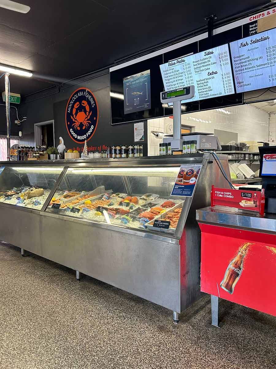Stainless Steel Display Case Filled With Food In A Restaurant — Mooloolaba Fisheries On The Spit In Mooloolaba, QLD