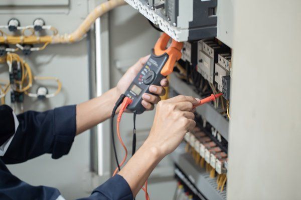 Electrician Work Tester Measuring Voltage — Farmington, NM — Four Corners Electric Co. Electrician Work Tester Measuring Voltage — Farmington, NM — Four Corners Electric Co.