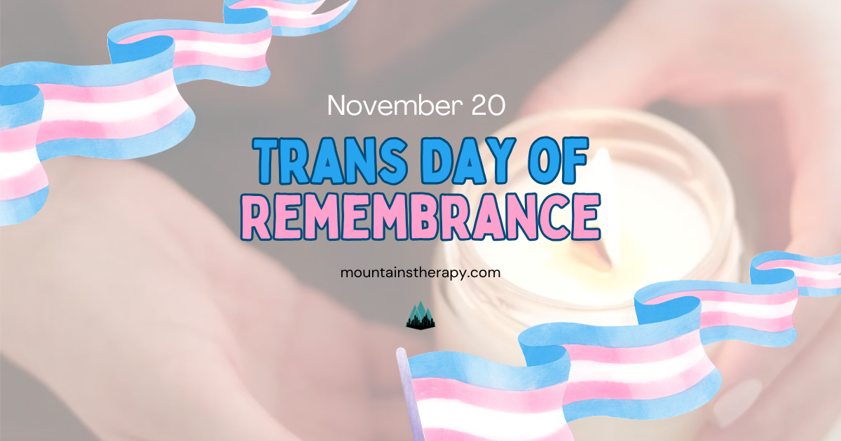 Trans Day of Remembrance graphic. Hands holding a lit candle with the trans flag colors and text.