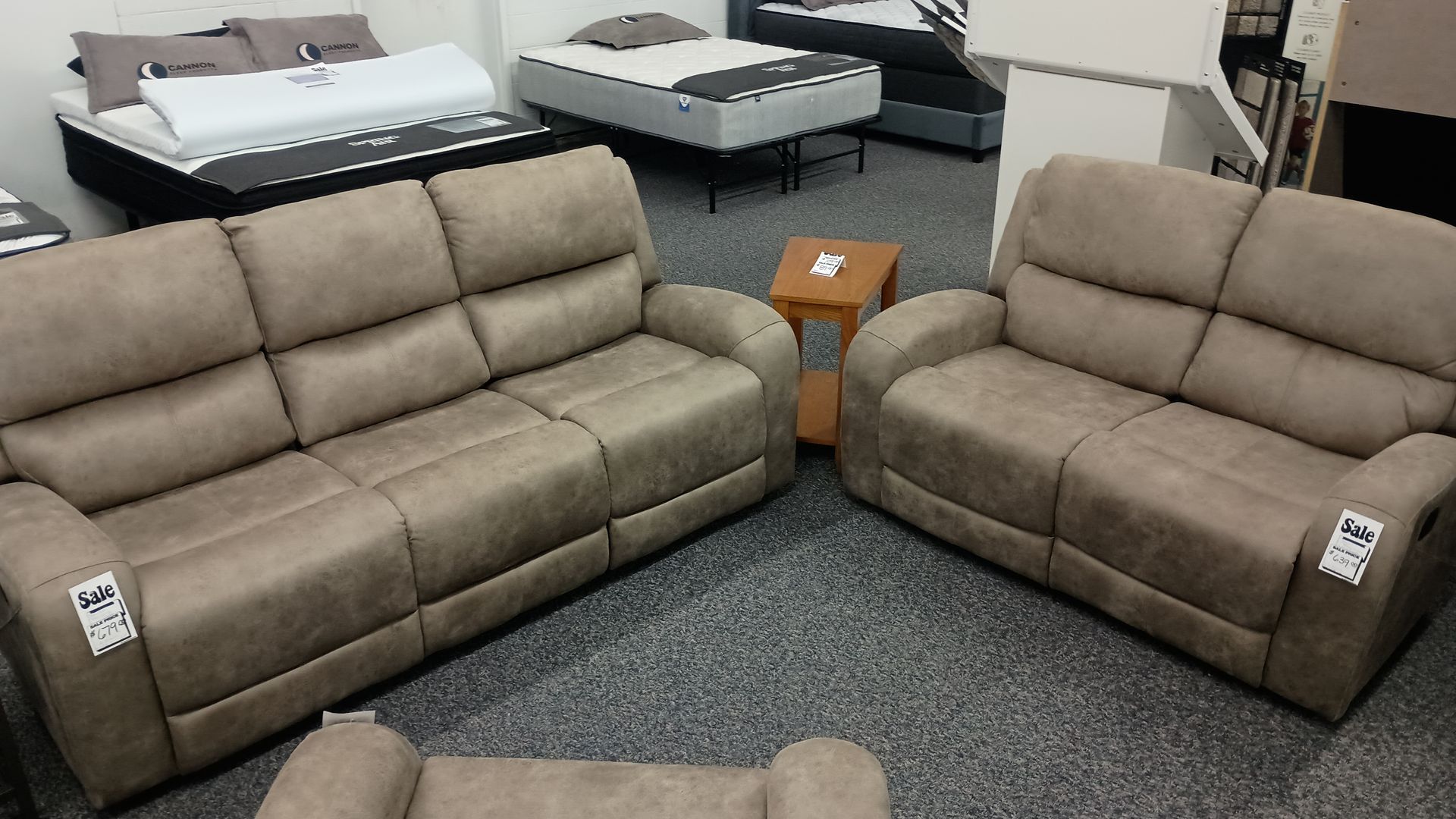 Two beige leather couches
