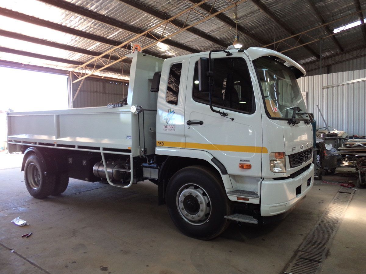 White Tipper Truck — Welders in Dubbo