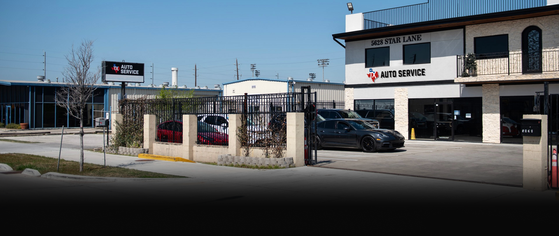 A sunny street view showing a commercial building with the