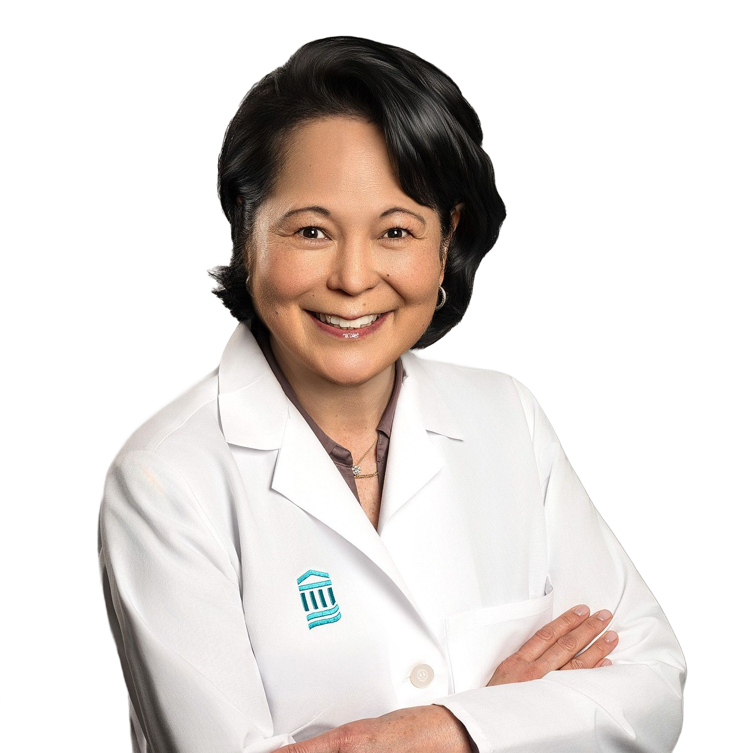 Smiling older doctor with glasses, stethoscope, white coat.