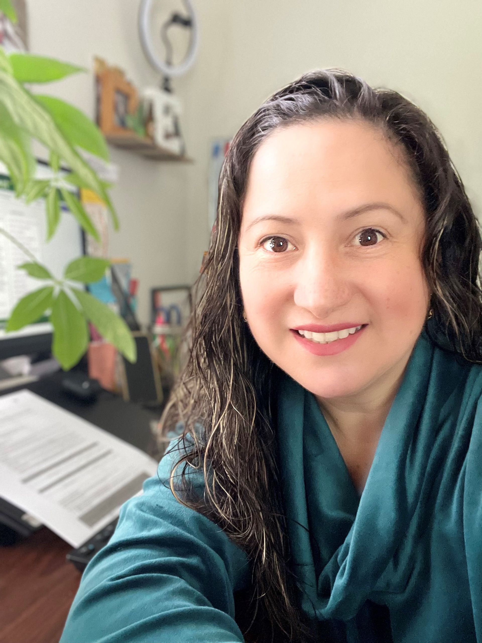 BHN staff member selfie - wearing green for mental health awareness