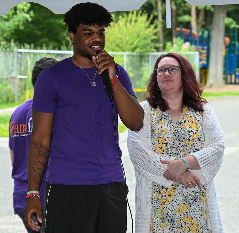 BHN kamp for kids opening day celebration - staff speaking at the event